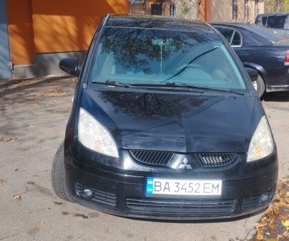 Черный Мицубиси Кольт, объемом двигателя 1.3 л и пробегом 215 тыс. км за 4300 $, фото 3 на Automoto.ua