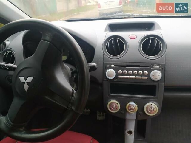 Черный Мицубиси Кольт, объемом двигателя 1.33 л и пробегом 151 тыс. км за 4500 $, фото 4 на Automoto.ua