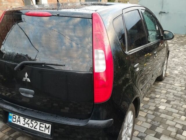 Черный Мицубиси Кольт, объемом двигателя 1.3 л и пробегом 215 тыс. км за 4300 $, фото 1 на Automoto.ua