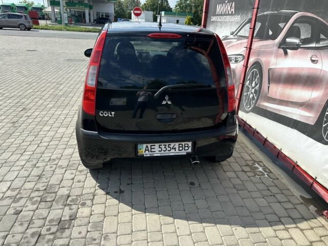 Міцубісі Кольт 2006 у Мукачеве на Automoto.ua Чорний Міцубісі Кольт, об'ємом двигуна 1.3 л та пробігом 255 тис. км за 2000 $, фото 12 на Automoto.ua