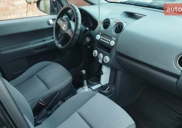 Чорний Міцубісі Кольт, об'ємом двигуна 1.3 л та пробігом 215 тис. км за 3800 $, фото 4 на Automoto.ua