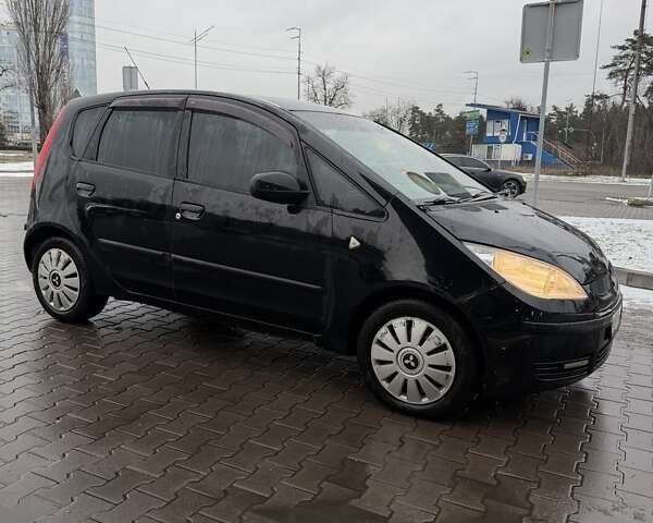 Черный Мицубиси Кольт, объемом двигателя 1.33 л и пробегом 266 тыс. км за 3300 $, фото 2 на Automoto.ua