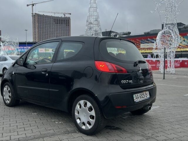 Черный Мицубиси Кольт, объемом двигателя 1.3 л и пробегом 134 тыс. км за 3600 $, фото 3 на Automoto.ua