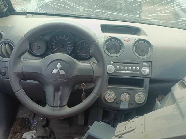 Чорний Міцубісі Кольт, об'ємом двигуна 1.3 л та пробігом 200 тис. км за 500 $, фото 5 на Automoto.ua