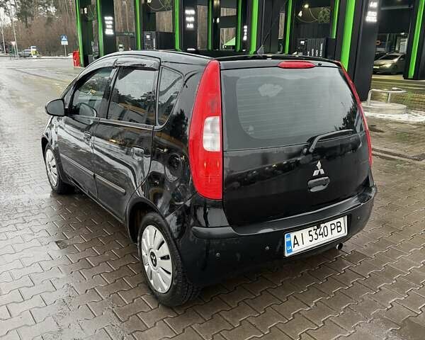 Черный Мицубиси Кольт, объемом двигателя 1.33 л и пробегом 266 тыс. км за 3300 $, фото 5 на Automoto.ua