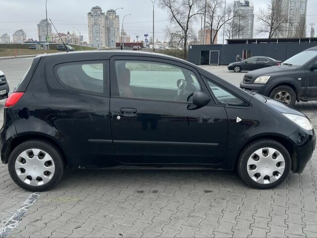 Черный Мицубиси Кольт, объемом двигателя 1.3 л и пробегом 134 тыс. км за 3600 $, фото 7 на Automoto.ua