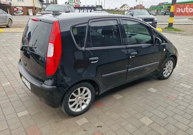 Черный Мицубиси Кольт, объемом двигателя 1.33 л и пробегом 234 тыс. км за 4555 $, фото 4 на Automoto.ua