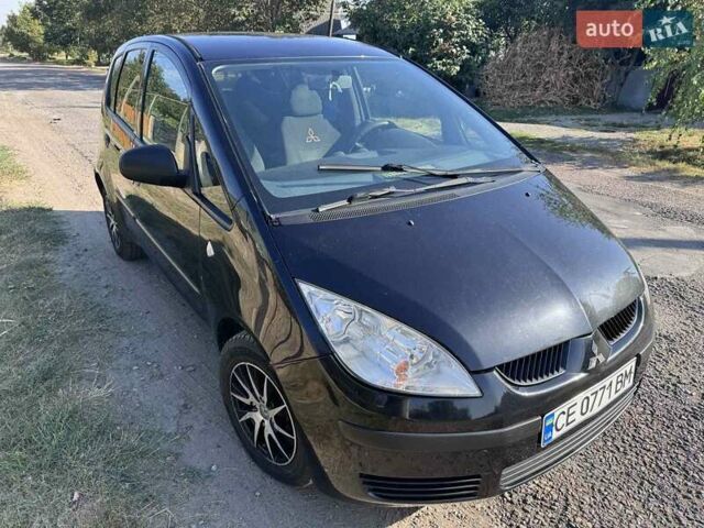 Чорний Міцубісі Кольт, об'ємом двигуна 1.33 л та пробігом 230 тис. км за 4000 $, фото 1 на Automoto.ua