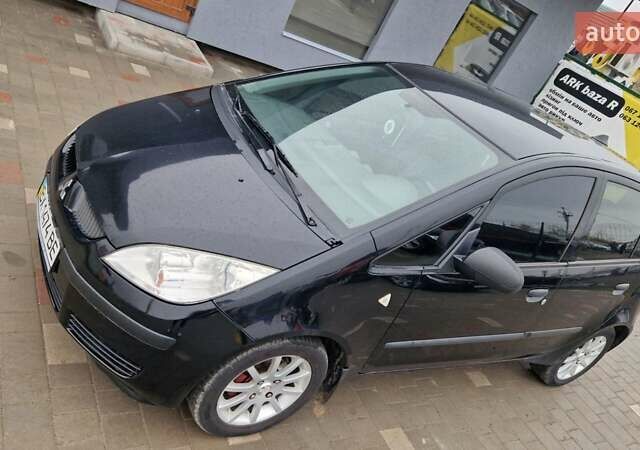 Черный Мицубиси Кольт, объемом двигателя 1.33 л и пробегом 234 тыс. км за 4555 $, фото 8 на Automoto.ua