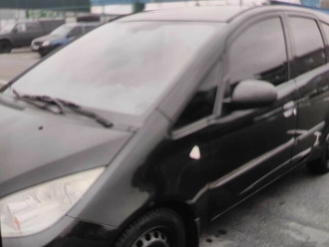 Чорний Міцубісі Кольт, об'ємом двигуна 1.3 л та пробігом 184 тис. км за 5000 $, фото 5 на Automoto.ua