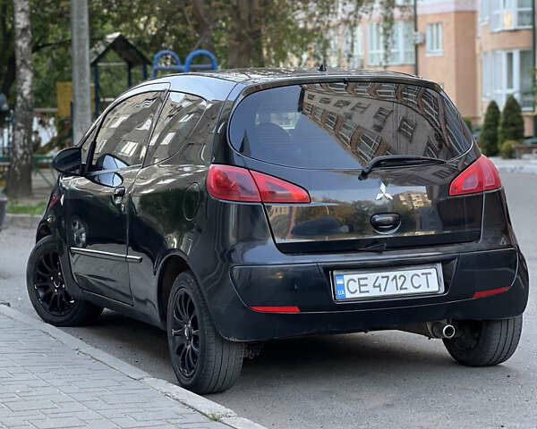 Черный Мицубиси Кольт, объемом двигателя 1.3 л и пробегом 167 тыс. км за 4600 $, фото 1 на Automoto.ua