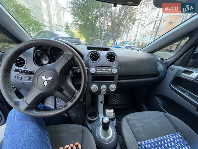 Черный Мицубиси Кольт, объемом двигателя 1.3 л и пробегом 167 тыс. км за 4600 $, фото 6 на Automoto.ua