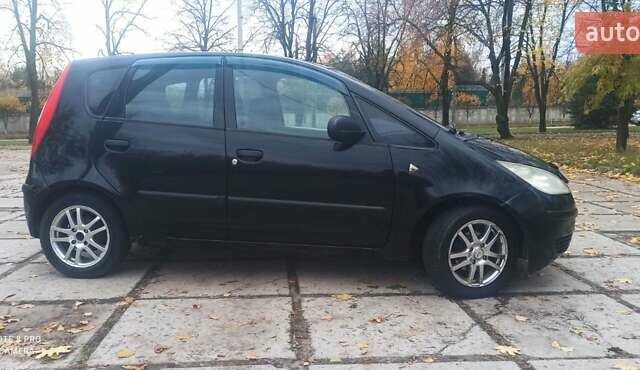 Чорний Міцубісі Кольт, об'ємом двигуна 1.3 л та пробігом 200 тис. км за 3000 $, фото 4 на Automoto.ua