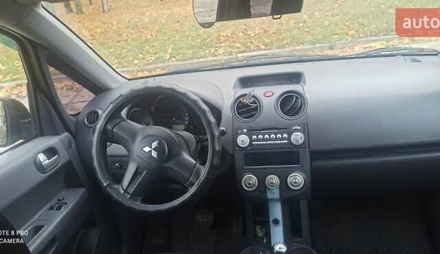 Чорний Міцубісі Кольт, об'ємом двигуна 1.3 л та пробігом 200 тис. км за 3000 $, фото 2 на Automoto.ua