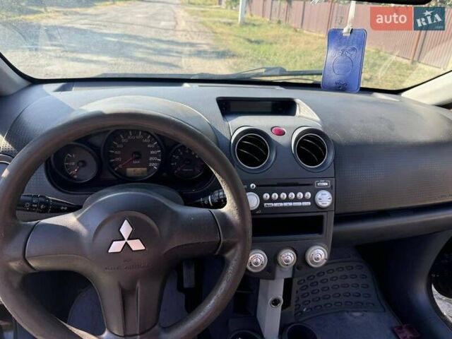 Чорний Міцубісі Кольт, об'ємом двигуна 1.33 л та пробігом 230 тис. км за 4000 $, фото 12 на Automoto.ua