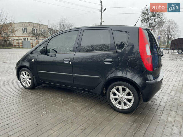 Чорний Міцубісі Кольт, об'ємом двигуна 1.3 л та пробігом 184 тис. км за 5000 $, фото 9 на Automoto.ua