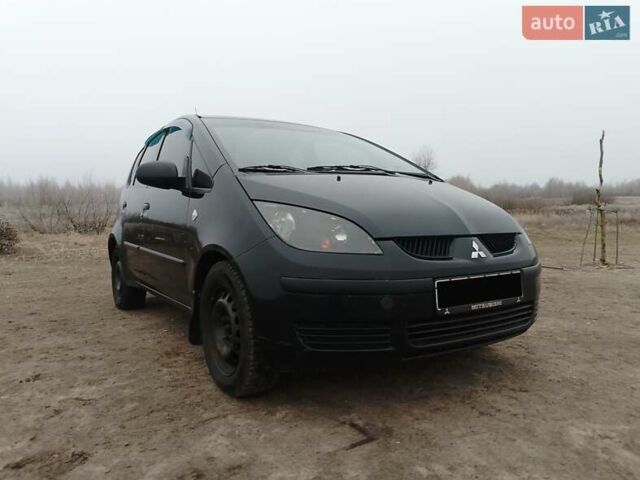 Черный Мицубиси Кольт, объемом двигателя 1.33 л и пробегом 285 тыс. км за 4500 $, фото 3 на Automoto.ua