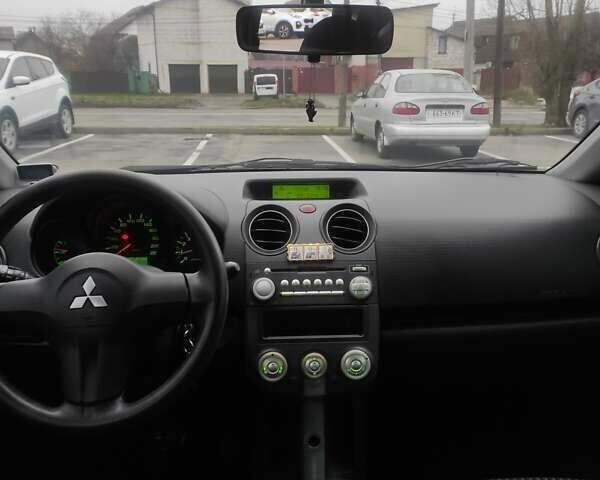 Черный Мицубиси Кольт, объемом двигателя 1.33 л и пробегом 184 тыс. км за 5000 $, фото 12 на Automoto.ua