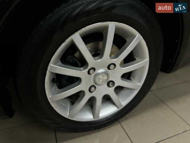 Черный Мицубиси Кольт, объемом двигателя 1.33 л и пробегом 223 тыс. км за 3750 $, фото 9 на Automoto.ua