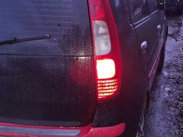 Черный Мицубиси Кольт, объемом двигателя 1.3 л и пробегом 280 тыс. км за 3500 $, фото 2 на Automoto.ua