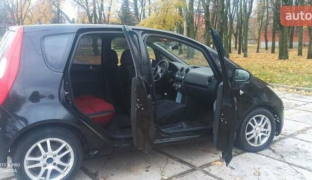 Чорний Міцубісі Кольт, об'ємом двигуна 1.3 л та пробігом 200 тис. км за 3000 $, фото 3 на Automoto.ua