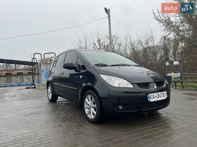 Чорний Міцубісі Кольт, об'ємом двигуна 1.3 л та пробігом 184 тис. км за 5000 $, фото 4 на Automoto.ua