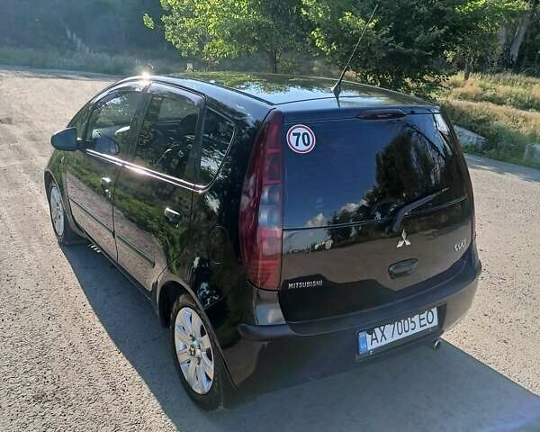 Чорний Міцубісі Кольт, об'ємом двигуна 1.33 л та пробігом 300 тис. км за 4200 $, фото 11 на Automoto.ua