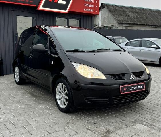 Черный Мицубиси Кольт, объемом двигателя 1.3 л и пробегом 154 тыс. км за 4700 $, фото 1 на Automoto.ua