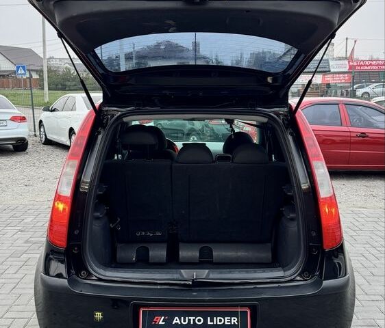 Черный Мицубиси Кольт, объемом двигателя 1.3 л и пробегом 154 тыс. км за 4700 $, фото 4 на Automoto.ua