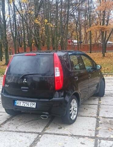Чорний Міцубісі Кольт, об'ємом двигуна 1.3 л та пробігом 200 тис. км за 3000 $, фото 7 на Automoto.ua