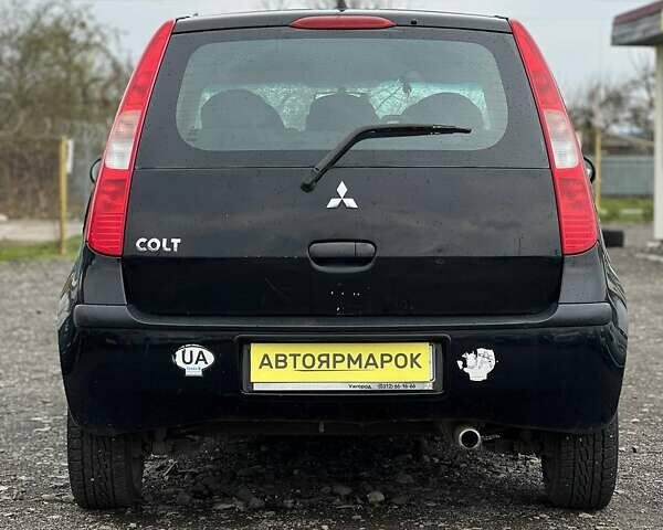 Черный Мицубиси Кольт, объемом двигателя 0 л и пробегом 223 тыс. км за 3490 $, фото 2 на Automoto.ua