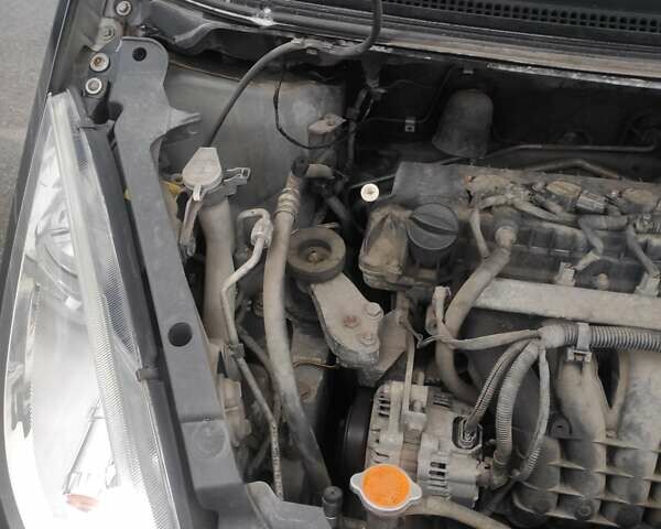 Черный Мицубиси Кольт, объемом двигателя 1.33 л и пробегом 184 тыс. км за 5000 $, фото 14 на Automoto.ua