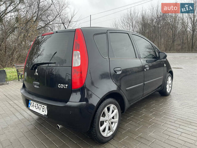 Чорний Міцубісі Кольт, об'ємом двигуна 1.3 л та пробігом 184 тис. км за 5000 $, фото 6 на Automoto.ua