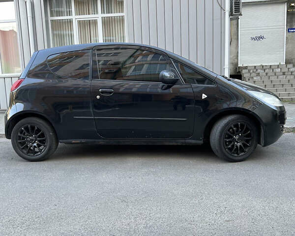 Черный Мицубиси Кольт, объемом двигателя 1.3 л и пробегом 167 тыс. км за 4600 $, фото 2 на Automoto.ua