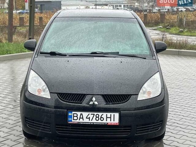 Чорний Міцубісі Кольт, об'ємом двигуна 1.33 л та пробігом 253 тис. км за 4500 $, фото 4 на Automoto.ua