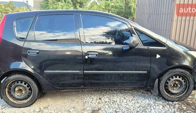 Чорний Міцубісі Кольт, об'ємом двигуна 1.3 л та пробігом 136 тис. км за 4500 $, фото 6 на Automoto.ua