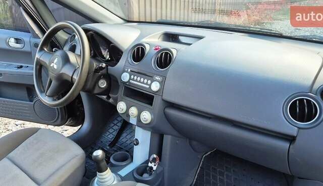 Чорний Міцубісі Кольт, об'ємом двигуна 1.3 л та пробігом 136 тис. км за 4500 $, фото 9 на Automoto.ua