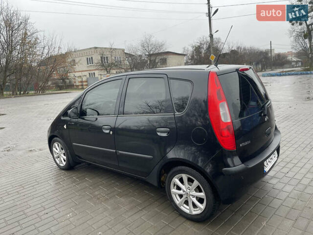 Чорний Міцубісі Кольт, об'ємом двигуна 1.3 л та пробігом 184 тис. км за 5000 $, фото 11 на Automoto.ua
