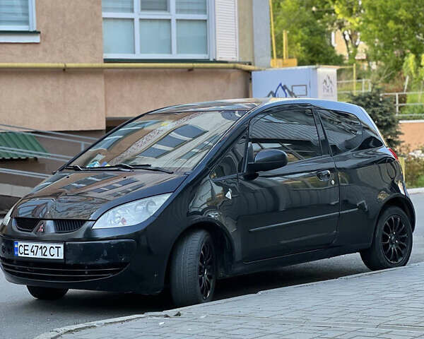 Черный Мицубиси Кольт, объемом двигателя 1.3 л и пробегом 167 тыс. км за 4600 $, фото 4 на Automoto.ua