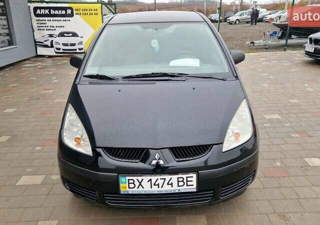 Черный Мицубиси Кольт, объемом двигателя 1.33 л и пробегом 234 тыс. км за 4555 $, фото 1 на Automoto.ua