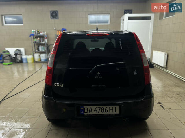 Черный Мицубиси Кольт, объемом двигателя 1.33 л и пробегом 223 тыс. км за 3750 $, фото 3 на Automoto.ua