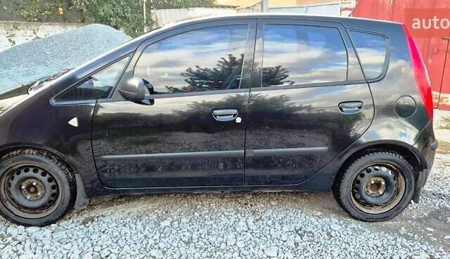 Чорний Міцубісі Кольт, об'ємом двигуна 1.3 л та пробігом 136 тис. км за 4500 $, фото 2 на Automoto.ua