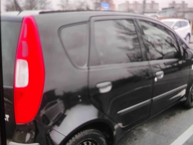 Чорний Міцубісі Кольт, об'ємом двигуна 1.3 л та пробігом 184 тис. км за 5000 $, фото 3 на Automoto.ua