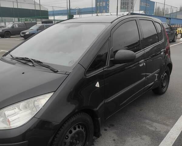 Черный Мицубиси Кольт, объемом двигателя 1.33 л и пробегом 184 тыс. км за 5000 $, фото 5 на Automoto.ua