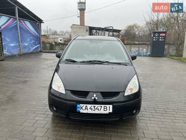Чорний Міцубісі Кольт, об'ємом двигуна 1.3 л та пробігом 184 тис. км за 5000 $, фото 2 на Automoto.ua