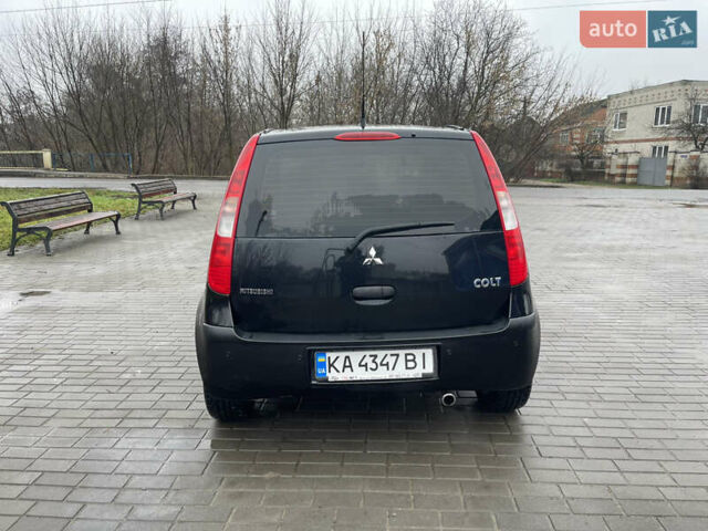 Чорний Міцубісі Кольт, об'ємом двигуна 1.3 л та пробігом 184 тис. км за 5000 $, фото 7 на Automoto.ua