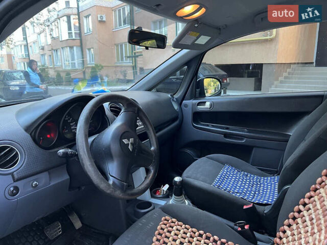 Черный Мицубиси Кольт, объемом двигателя 1.3 л и пробегом 167 тыс. км за 4600 $, фото 5 на Automoto.ua
