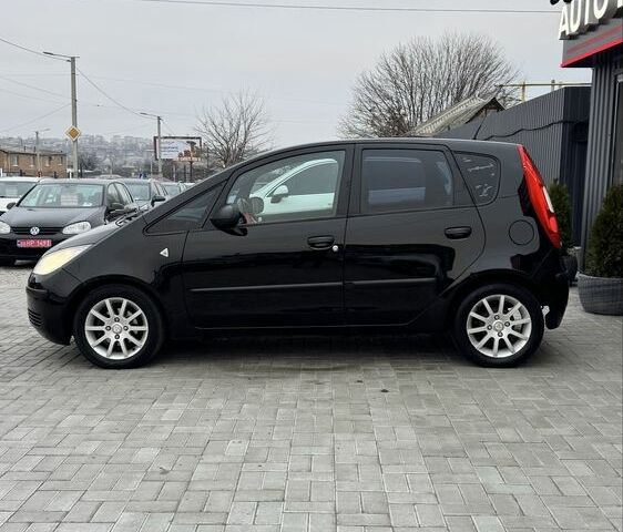 Черный Мицубиси Кольт, объемом двигателя 1.3 л и пробегом 154 тыс. км за 4700 $, фото 6 на Automoto.ua