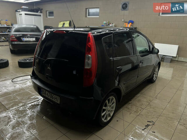 Черный Мицубиси Кольт, объемом двигателя 1.33 л и пробегом 223 тыс. км за 3750 $, фото 1 на Automoto.ua