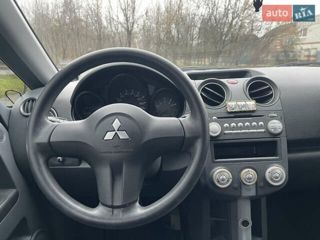Чорний Міцубісі Кольт, об'ємом двигуна 1.3 л та пробігом 184 тис. км за 5000 $, фото 17 на Automoto.ua